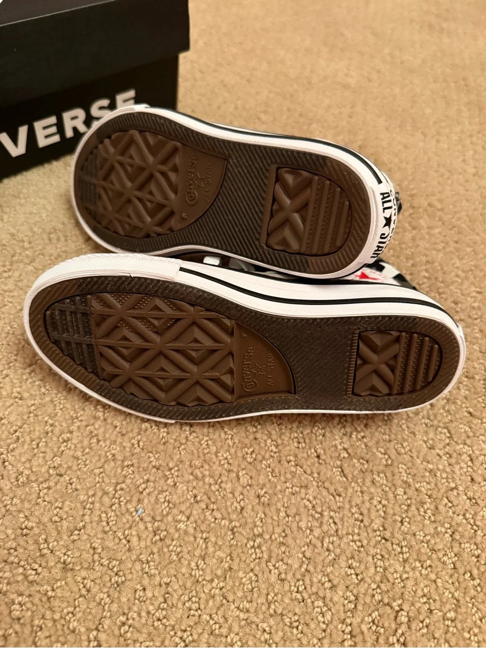 New in box. Converse high shark print sneakers. Size 11 ‘junior’.